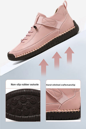 A pink mid-calf lace-up shoe with a black outsole, shown on a light gray background with marketing text and inset detail photos of the outsole and stitching. The image highlights features such as a non-slip rubber outsole and hand-stitched craftsmanship.