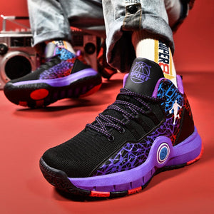 A pair of black basketball shoes with purple and blue patterned details, shown on a model sitting on a red floor. The image includes promotional text overlays reading 'STRENGTH #power series basketball shoes#' and 'COLOR EXPRESSION Color performance'.