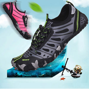 A pair of water shoes shown in a promotional graphic. The main shoe is black and gray with neon green accents, and a second shoe in pink and black appears floating in the upper left.