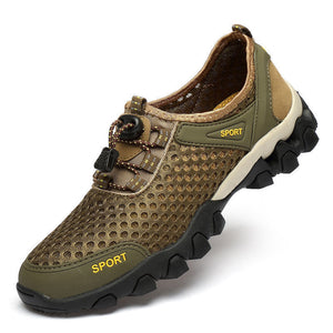 Brown sports shoe with black sole on a white background