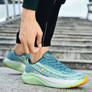 A person wearing teal and mint blue running shoes with a white and light green sole, paired with black track pants, standing on stone stairs.