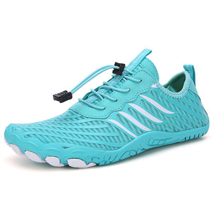 Turquoise water shoe with white sole on a white background