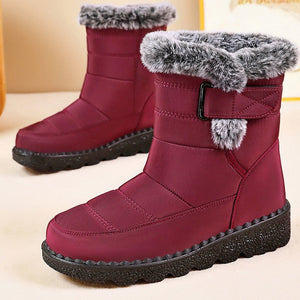 A pair of women's mid-calf winter boots in burgundy with gray faux-fur trim and black soles, shown in a two-panel collage on a light beige background.