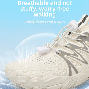 A close-up of a white athletic sneaker with gray side accents and white laces, shown against a light blue background with promotional text reading 'Breathable and not stuffy, worry-free walking.'.
