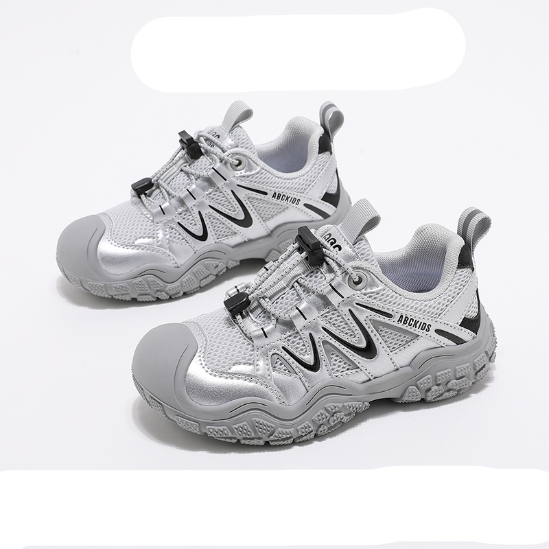 White children's shoes with black accents on a white background, featuring the ABCKIDS brand.