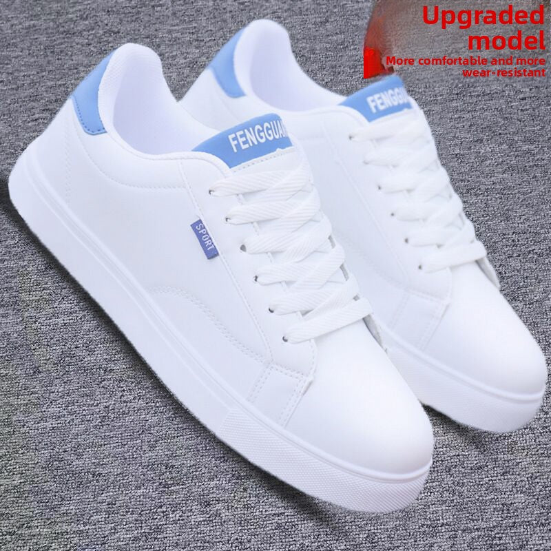 White ActiveCore sneakers with blue heel accents shown from the front side angle