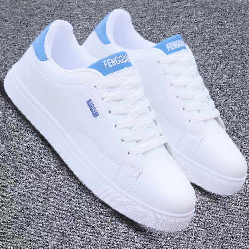 White ActiveCore sport sneakers with blue heel accents on gray fabric