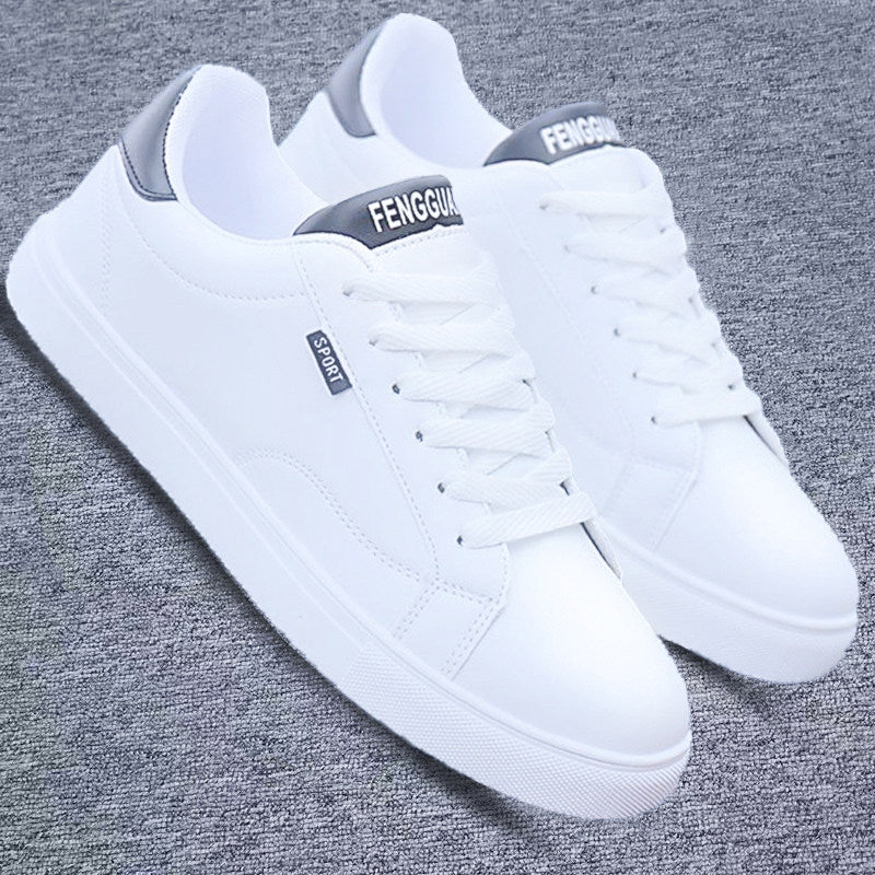 White ActiveCore sport sneakers with gray heel accents on gray fabric
