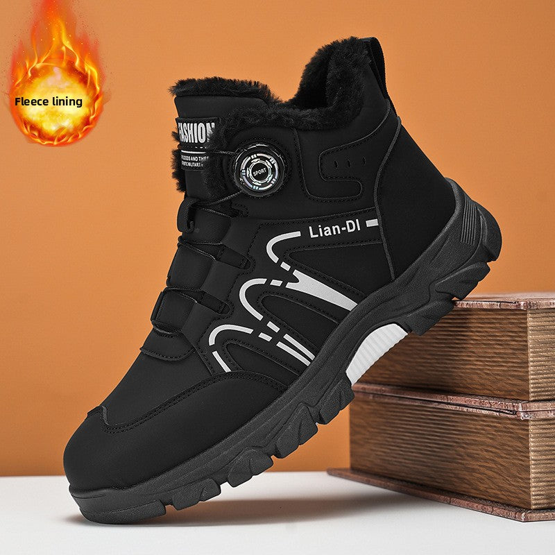 Black winter boot with brand name on a wooden box against an orange background