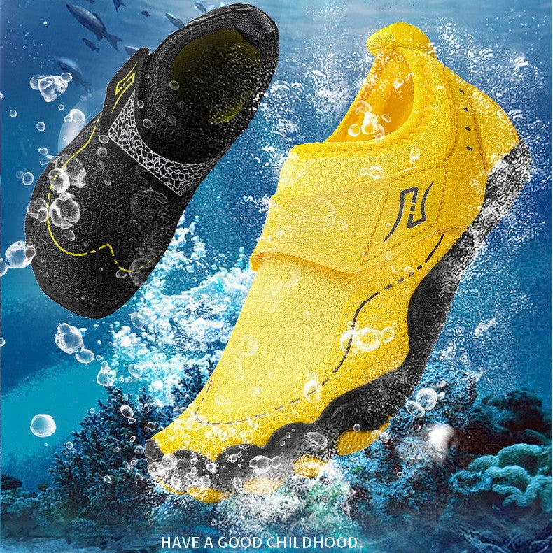 Two water shoes floating underwater in a blue ocean scene, one black with yellow accents and one bright yellow with black accents. White text at the top reads 'WITH THE SUMMER' and 'Enjoy a cool and stylish summer', with 'HAVE A GOOD CHILDHOOD.
