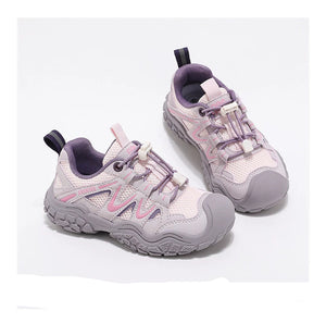A pair of children's athletic sneakers in light purple, lavender, and gray, featuring mesh panels, lace-up closure, and textured soles, displayed on a clean white background with text at the bottom.