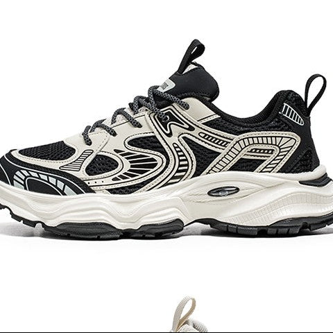 A pair of chunky platform sneakers with a black and off-white color scheme, featuring a thick sole and abstract graphic overlays. The image includes a top-down view at the top, a main side profile view in the center with 'V-SNEAKER' text, and a small detail view at the bottom.