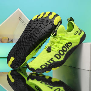 Bright green sneakers with black soles on a reflective surface