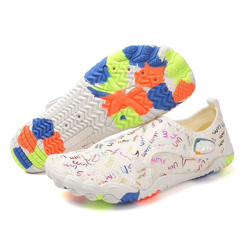 Colorful children's shoes with a white sole on a white background