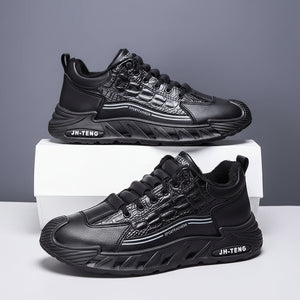 Black sneakers with 'JH-TENG' branding on a gray background