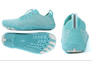 A pair of light aqua blue athletic sneakers shown from multiple angles, including top, side, sole, and back views. The shoes feature a textured knit upper, white wave-like line patterns, white laces, and a bright yellow interior lining visible on one shoe.