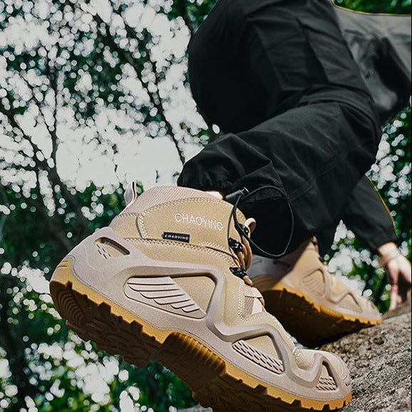 Person wearing beige hiking boots with a blurred natural background