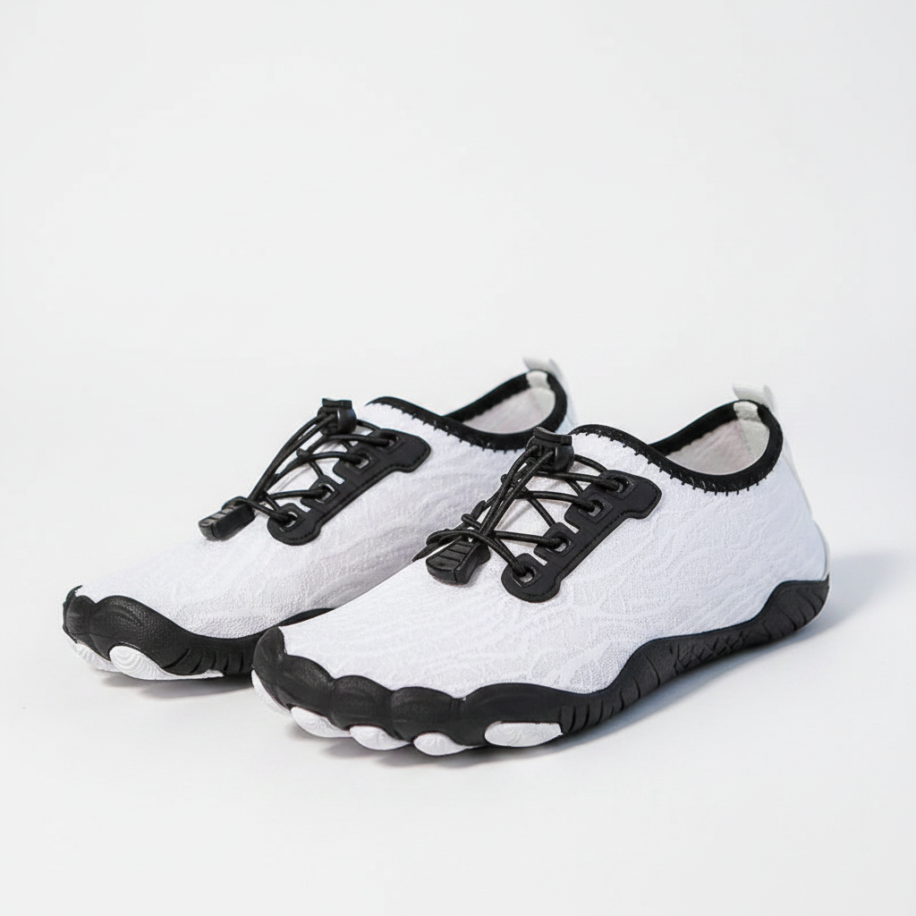 White and black athletic water shoes with a lace-up front, shown on a treadmill with a person's legs visible.
