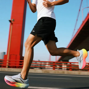 Person running on a bridge with a clear blue sky