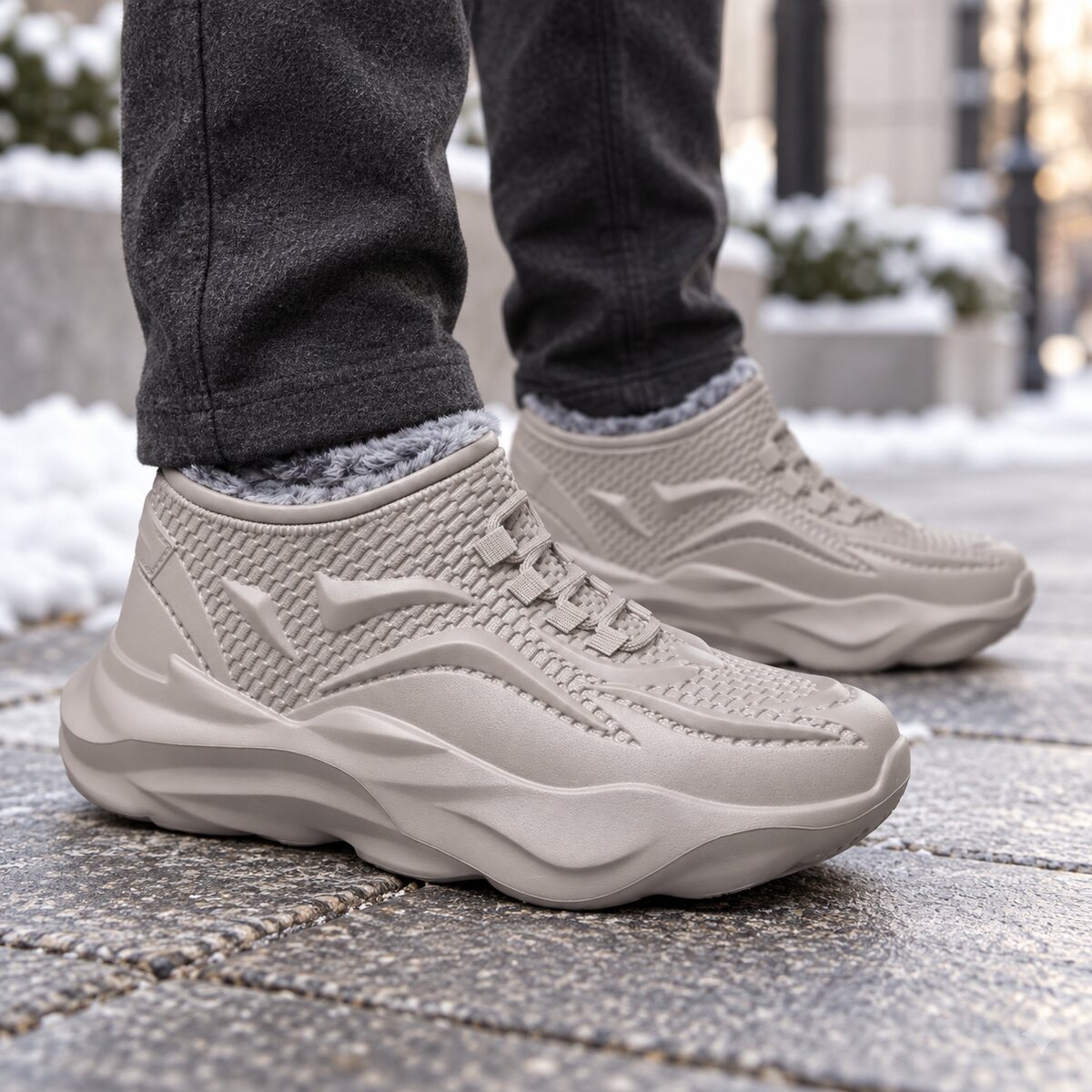 WeatherShield gray plush-lined winter boots worn on a cold city walk